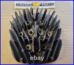 NOS 11111-30100 TM250 1972 / 1973 Genuine Suzuki Cylinder Head with some marks NOS 11111-30100 TM250 1972 / 1973 Genuine Suzuki Cylinder Head with some marks
