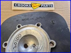 NOS 11111-30100 TM250 1972 / 1973 Genuine Suzuki Cylinder Head with some marks NOS 11111-30100 TM250 1972 / 1973 Genuine Suzuki Cylinder Head with some marks