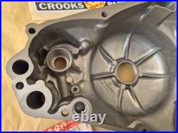 NOS 11341-01A10 TS125X 1986 to 1988 Genuine Suzuki Black Clutch Cover with marks