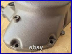 NOS 11341-01A10 TS125X 1986 to 1988 Genuine Suzuki Black Clutch Cover with marks