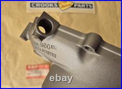 NOS 11341-01A10 TS125X 1986 to 1988 Genuine Suzuki Black Clutch Cover with marks