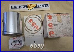 NOS 12110-41791 & 12140-41791 RM370 +. 75mm Genuine Suzuki Piston & Ring Set