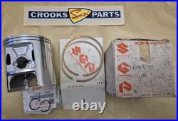NOS 12110-41791 & 12140-41791 RM370 +. 75mm Genuine Suzuki Piston & Ring Set