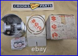 NOS 12110-41791 & 12140-41791 RM370 +. 75mm Genuine Suzuki Piston & Ring Set