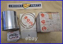 NOS 12110-41791 & 12140-41791 RM370 +. 75mm Genuine Suzuki Piston & Ring Set