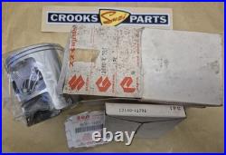 NOS 12110-41791 & 12140-41791 RM370 +. 75mm Genuine Suzuki Piston & Ring Set