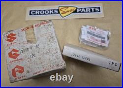 NOS 12110-41791 & 12140-41791 RM370 +. 75mm Genuine Suzuki Piston & Ring Set