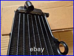 NOS 17720-27C30 1991 RM125 M Genuine Suzuki Left Hand Radiator NOS 17720-27C30 1991 RM125 M Genuine Suzuki Left Hand Radiator