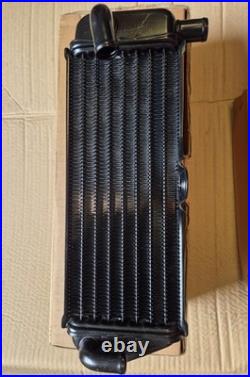 NOS 17720-27C30 1991 RM125 M Genuine Suzuki Left Hand Radiator NOS 17720-27C30 1991 RM125 M Genuine Suzuki Left Hand Radiator