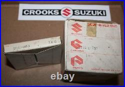 NOS Suzuki RM250 +. 25mm Suzuki Piston & Ring Set, 12110-41702 & 12140-40701