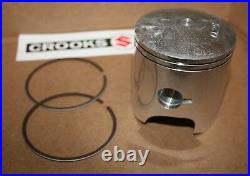 NOS Suzuki RM250 +. 25mm Suzuki Piston & Ring Set, 12110-41702 & 12140-40701