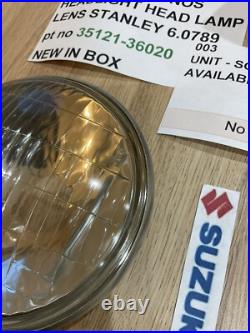 SUZUKI GT125 NOS HEADLIGHT HEAD LAMP LENS STANLEY 6.0789 pt no 35121-36020 NEW