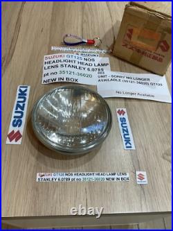 SUZUKI GT125 NOS HEADLIGHT HEAD LAMP LENS STANLEY 6.0789 pt no 35121-36020 NEW