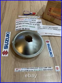 SUZUKI GT125 NOS HEADLIGHT HEAD LAMP LENS STANLEY 6.0789 pt no 35121-36020 NEW