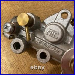Suzuki GP 100/125 oil pump assembly 16100-39300 NOS
