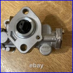 Suzuki GP 100/125 oil pump assembly 16100-39300 NOS