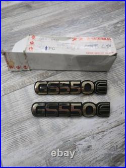 Suzuki GS550E PAIR SIDEPANEL BADGES NOS rare golds colour 68131-47300