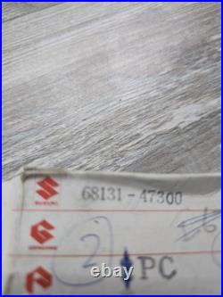 Suzuki GS550E PAIR SIDEPANEL BADGES NOS rare golds colour 68131-47300