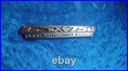 Suzuki GSX750 98-2000 Side Panel Emblems Pair NOS 68131-03F10 / 68141-03F10 NOS