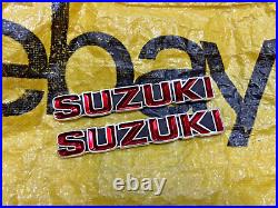 Suzuki GT185 GT250 GT380 GT550 T350 Tank Badges Emblem NOS Genuine 68111-33000 Suzuki GT185 GT250 GT380 GT550 T350 Tank Badges Emblem NOS Genuine 68111-33000