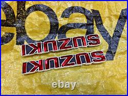 Suzuki GT185 GT250 GT380 GT550 T350 Tank Badges Emblem NOS Genuine 68111-33000 Suzuki GT185 GT250 GT380 GT550 T350 Tank Badges Emblem NOS Genuine 68111-33000