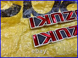 Suzuki GT185 GT250 GT380 GT550 T350 Tank Badges Emblem NOS Genuine 68111-33000 Suzuki GT185 GT250 GT380 GT550 T350 Tank Badges Emblem NOS Genuine 68111-33000