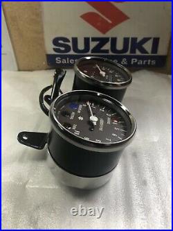 Suzuki GT185 Instrument Assembly Speedometer Tachometer. NOS. 34100-36628