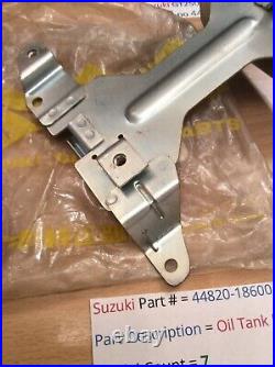 Suzuki GT250 T350 nos oil tank bracket holder new pt no 44820-18600 withparts tag