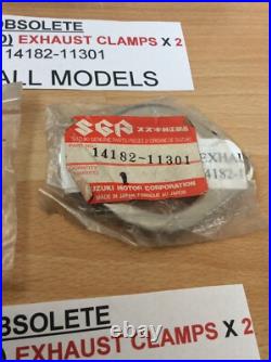 Suzuki GT250 X7 ALL NOS EXHAUST CLAMPS X 2 PIECES PT NO 14182-11301 NEW IN BAGS