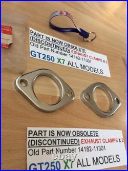 Suzuki GT250 X7 ALL NOS EXHAUST CLAMPS X 2 PIECES PT NO 14182-11301 NEW IN BAGS
