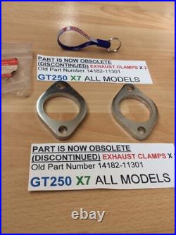 Suzuki GT250 X7 ALL NOS EXHAUST CLAMPS X 2 PIECES PT NO 14182-11301 NEW IN BAGS