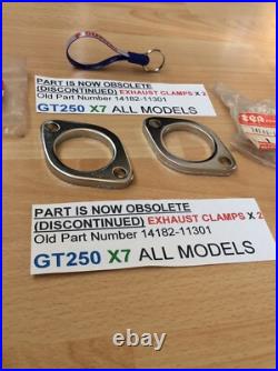 Suzuki GT250 X7 ALL NOS EXHAUST CLAMPS X 2 PIECES PT NO 14182-11301 NEW IN BAGS