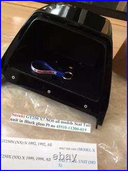 Suzuki GT250 X7 NOS all models Seat Tail unit in Black Gloss pt 45510-11300-019 Suzuki GT250 X7 NOS all models Seat Tail unit in Black Gloss pt 45510-11300-019