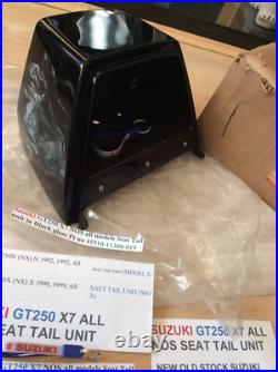 Suzuki GT250 X7 NOS all models Seat Tail unit in Black Gloss pt 45510-11300-019 Suzuki GT250 X7 NOS all models Seat Tail unit in Black Gloss pt 45510-11300-019