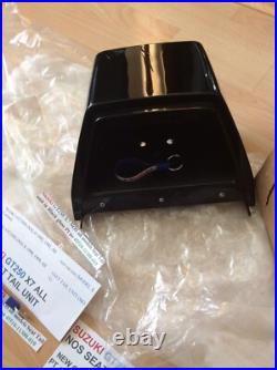 Suzuki GT250 X7 NOS all models Seat Tail unit in Black Gloss pt 45510-11300-019 Suzuki GT250 X7 NOS all models Seat Tail unit in Black Gloss pt 45510-11300-019