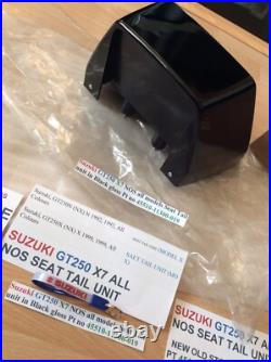 Suzuki GT250 X7 NOS all models Seat Tail unit in Black Gloss pt 45510-11300-019 Suzuki GT250 X7 NOS all models Seat Tail unit in Black Gloss pt 45510-11300-019
