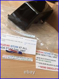 Suzuki GT250 X7 NOS all models Seat Tail unit in Black Gloss pt 45510-11300-019 Suzuki GT250 X7 NOS all models Seat Tail unit in Black Gloss pt 45510-11300-019