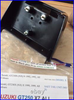 Suzuki GT250 X7 NOS all models Seat Tail unit in Black Gloss pt 45510-11300-019 Suzuki GT250 X7 NOS all models Seat Tail unit in Black Gloss pt 45510-11300-019