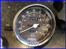 Suzuki GT250 X7 X5 Speedometer Tachometer Clocks with NOS bracket