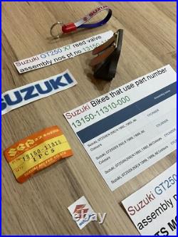 Suzuki GT250 X7 all models REED VALVE ASSEMBLY nos pt 13150-11310 with parts tag