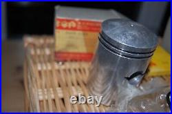 Suzuki T10 PISTONS AND RINGS 0.5 OVERSIZE NOS