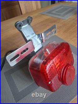 Vintage Suzuki T250 TS 50 100 125 185 250 400 Rear Lamp and Bracket. NOS OEM