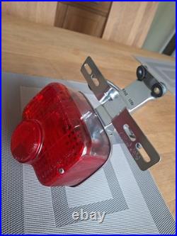 Vintage Suzuki T250 TS 50 100 125 185 250 400 Rear Lamp and Bracket. NOS OEM